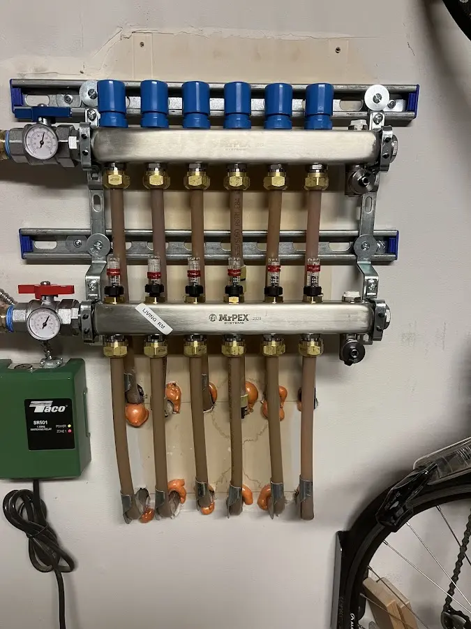 Plumber performing Gas Line Installation at a residential property in Millstone